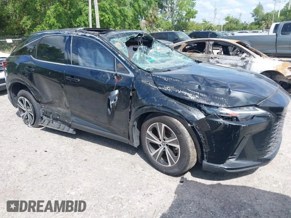 2023 Lexus RX with VIN JTJCHMAAXP2001561, listed as a IAAI auction lot 40850514 with 1 mi miles. Bid and sale history available at carsss.com. Image 1.