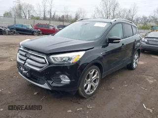2017 Ford Escape Titanium with VIN 1FMCU0J95HUD37858, listed as a IAAI auction lot 41984629 with 87,163 mi miles and . Bid and sale history available at DreamBid. Image 16.