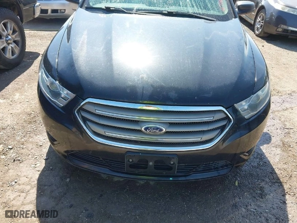 2014 Ford Taurus SE with VIN 1FAHP2D99EG165035, listed as a IAAI auction lot 41718083 with 184072 miles. Bid and sale history available at carsss.com. Image 6.