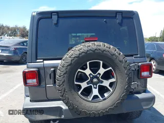 2020 Jeep Wrangler Unlimited Freedom z VIN 1C4HJXDG8LW338702, wystawiony jako IAAI lot #42006692 z przebiegiem 48 389 mil mil oraz . Historia ofert i sprzedaży dostępna na DreamBid. Obrazek 16.
