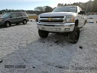 2013 Chevrolet Silverado 1500 LT with VIN 3GCPCSE04DG212962, listed as a Copart auction lot 83388404 with 232,507 mi miles and Salvage Title. Bid and sale history available at DreamBid. Image 11.