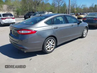 2013 Ford Fusion SE with VIN 3FA6P0H71DR364169, listed as a IAAI auction lot 42167658 with 196,073 mi miles. Bid and sale history available at carsss.com. Image 4.