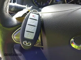 2014 Infiniti Q50 Premium with VIN JN1BV7AR1EM701665, listed as a IAAI auction lot 41276373 with 113,820 mi miles. Bid and sale history available at carsss.com. Image 11.