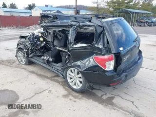 2011 Subaru Forester 2.5X Premium with VIN JF2SHACC0BH718411, listed as a IAAI auction lot 41515167 with 140,884 mi miles. Bid and sale history available at carsss.com. Image 3.
