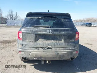 2019 Honda Passport Sport z VIN 5FNYF8H23KB025310, wystawiony jako IAAI lot #41958571 z przebiegiem 63 313 mil mil oraz . Historia ofert i sprzedaży dostępna na DreamBid. Obrazek 16.
