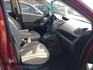 2012 Mazda 5 Grand Touring with VIN JM1CW2DL3C0144402, listed as a IAAI auction lot 41923524 with 150,584 mi miles and . Bid and sale history available at DreamBid. Image 5.