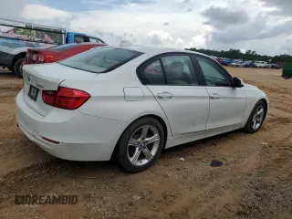 2014 BMW 3 Series 328i with VIN WBA3A5C59EP601899, listed as a Copart auction lot 61430675 with 205,396 mi miles and Salvage title. Bid and sale history available at DreamBid. Image 3.