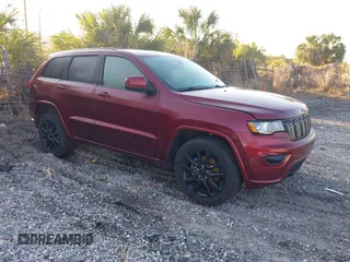 2018 Jeep Grand Cherokee Laredo with VIN 1C4RJFAG8JC285565, listed as a IAAI auction lot 41847198 with 96,814 mi miles and . Bid and sale history available at DreamBid. Image 1.