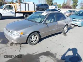 1999 Toyota Corolla VE z VIN 1NXBR18E6XZ225512, wystawiony jako IAAI lot #41842023 z przebiegiem 324 718 mil mil oraz . Historia ofert i sprzedaży dostępna na DreamBid. Obrazek 2.
