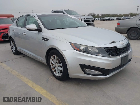 2013 Kia Optima LX with VIN KNAGM4A79D5377485, listed as a IAAI auction lot 41290306 with 172,253 mi miles. Bid and sale history available at carsss.com. Image 1.