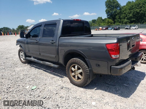 2011 Nissan Titan SL with VIN 1N6BA0ECXBN322611, listed as a Copart auction lot 63002925 with 159,785 mi miles and Salvage title. Bid and sale history available at DreamBid. Image 2.