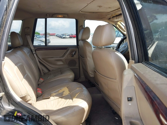 2002 Jeep Grand Cherokee Limited with VIN 1J8GX58N32C130002, listed as a IAAI auction lot 42179840 with 246,661 mi miles and . Bid and sale history available at DreamBid. Image 8.