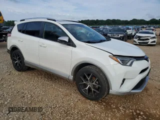 2016 Toyota RAV4 SE with VIN JTMJFREV5GD184074, listed as a Copart auction lot 60116955 with 182,240 mi miles and Salvage title. Bid and sale history available at DreamBid. Image 4.