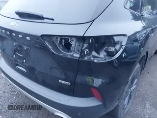 2020 Ford Escape SE Sport Hybrid with VIN 1FMCU9BZ1LUC61115, listed as a IAAI auction lot 41069836 with 99,927 mi miles and . Bid and sale history available at DreamBid. Image 22.