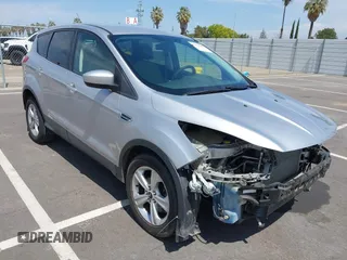 2015 Ford Escape SE with VIN 1FMCU9G93FUA26339, listed as a IAAI auction lot 42039281 with 185,729 mi miles and . Bid and sale history available at DreamBid. Image 1.
