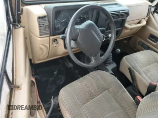 1999 Jeep Wrangler SE with VIN 1J4FY29P2XP451036, listed as a Copart auction lot 50551755 with 0 mi miles and Salvage Title. Bid and sale history available at carsss.com. Image 8.