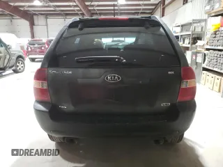 2005 Kia Sportage LX with VIN KNDJE723857118317, listed as a Copart auction lot 80383494 with 91,084 mi miles and Salvage Title. Bid and sale history available at carsss.com. Image 6.