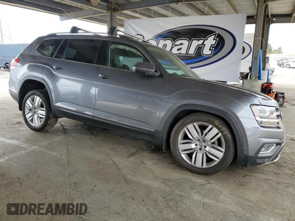 2018 Volkswagen Atlas SEL Premium with VIN 1V2NR2CA7JC576047, listed as a Copart auction lot 55309005 with 137,472 mi miles and Salvage title. Bid and sale history available at DreamBid. Image 4.