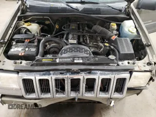 1998 Jeep Grand Cherokee Laredo with VIN 1J4GZ58S3WC207166, listed as a Copart auction lot 84243704 with 124,084 mi miles and Salvage Title. Bid and sale history available at carsss.com. Image 14.