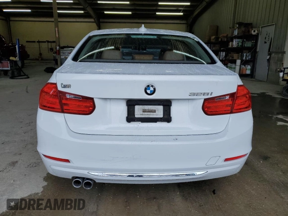 2013 BMW 3 Series 328i with VIN WBA3A5G52DNP18972, listed as a Copart auction lot 58122935 with 209,173 mi miles and Salvage title. Bid and sale history available at DreamBid. Image 7.