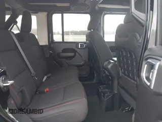 2021 Jeep Wrangler Unlimited Rubicon z VIN 1C4HJXFG8MW775419, wystawiony jako IAAI lot #41797178 z przebiegiem 56 166 mil mil oraz . Historia ofert i sprzedaży dostępna na DreamBid. Obrazek 8.