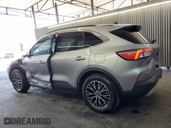 2021 Ford Escape Titanium Plug-In Hybrid z VIN 1FMCU0LZ8MUA66995, wystawiony jako Copart lot #60986765 z przebiegiem 69 609 mil mil oraz Czysty tytuł • Clean title. Historia ofert i sprzedaży dostępna na DreamBid. Obrazek 2.