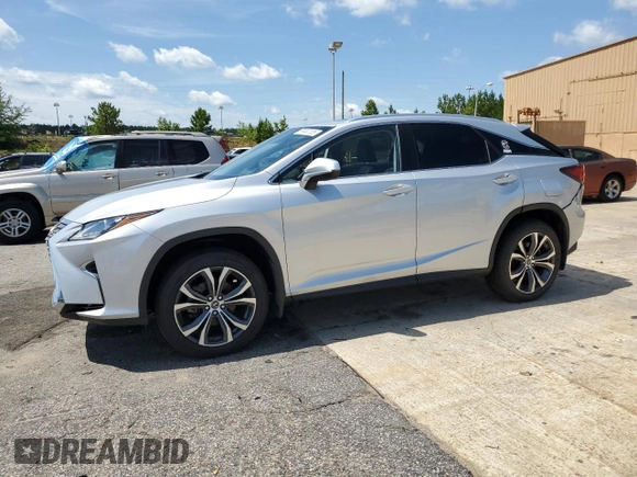 2018 Lexus RX 350 with VIN JTJBZMCA1J2034266, listed as a Copart auction lot 59900105 with 44,171 mi miles and Salvage title. Bid and sale history available at DreamBid. Image 1.