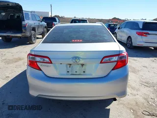 2014 Toyota Camry L with VIN 4T1BF1FK7EU856848, listed as a IAAI auction lot 41729604 with 100,148 mi miles. Bid and sale history available at carsss.com. Image 16.