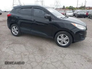 2011 Hyundai Tucson Limited with VIN KM8JUCACXBU293660, listed as a IAAI auction lot 42051931 with 99,995 mi miles and . Bid and sale history available at DreamBid. Image 1.