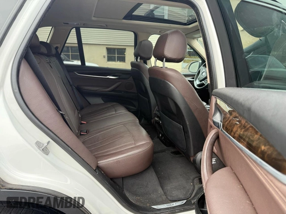 2016 BMW X5 xDrive35i with VIN 5UXKR0C56G0P30283, listed as a Copart auction lot 52831205 with 205,300 mi miles and Clean Title. Bid and sale history available at carsss.com. Image 6.