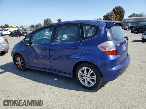 2009 Honda Fit Sport w/Navi with VIN JHMGE88639S037082, listed as a Copart auction lot 53303755 with 213,931 mi miles and Salvage Title. Bid and sale history available at carsss.com. Image 2.