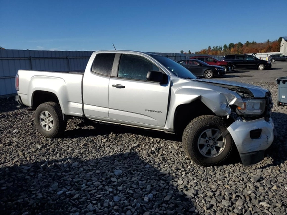 2016 GMC Canyon 2WD with VIN 1GTH5BEAXG1389414, listed as a Copart auction lot 77198134 with 82,004 mi miles and Salvage Title. Bid and sale history available at carsss.com. Image 4.