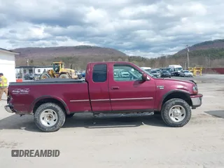 1998 Ford F-150 with VIN 1FTZX18W5WNC39962, listed as a IAAI auction lot 41951328 with 228,438 mi miles and . Bid and sale history available at DreamBid. Image 13.