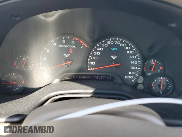 2004 Chevrolet Corvette with VIN 1G1YY22G145132963, listed as a Copart auction lot 74264184 with 74,077 mi miles and Salvage Title. Bid and sale history available at carsss.com. Image 9.