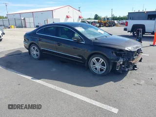 2010 Volkswagen CC Lux Plus with VIN WVWHN7AN1AE542428, listed as a IAAI auction lot 40251462 with 136,899 mi miles. Bid and sale history available at carsss.com. Image 1.