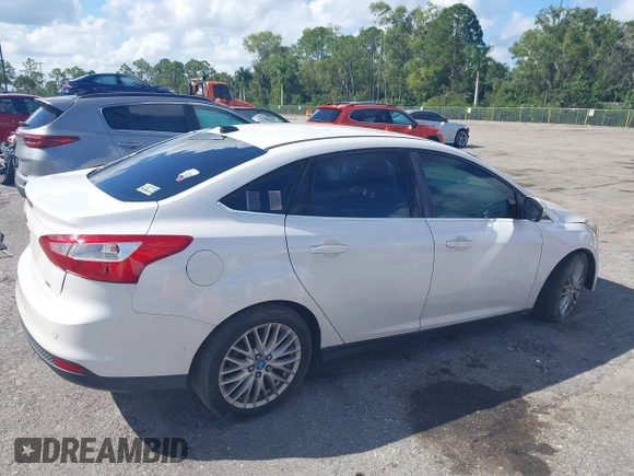 2012 Ford Focus SEL with VIN 1FAHP3H25CL282490, listed as a IAAI auction lot 40563360 with 223,864 mi miles. Bid and sale history available at carsss.com. Image 4.