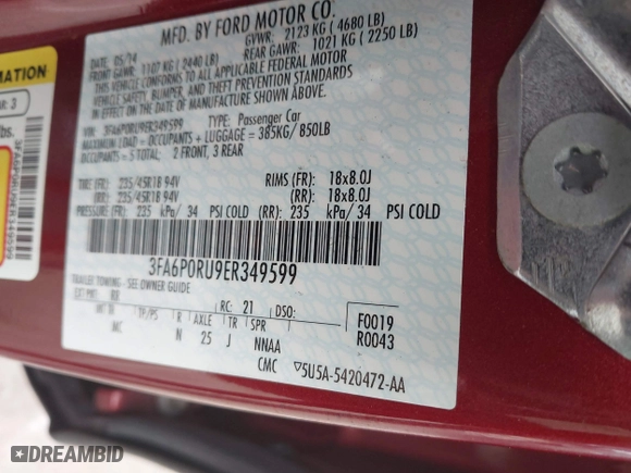 2014 Ford Fusion Titanium Hybrid with VIN 3FA6P0RU9ER349599, listed as a IAAI auction lot 41928864 with 94,312 mi miles. Bid and sale history available at carsss.com. Image 9.