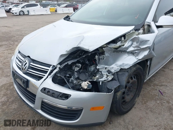 2010 Volkswagen Jetta Sedan S with VIN 3VWJZ7AJ1AM003298, listed as a IAAI auction lot 41583771 with 127,234 mi miles. Bid and sale history available at carsss.com. Image 6.