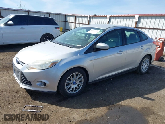 2012 Ford Focus SE with VIN 1FAHP3F24CL178236, listed as a IAAI auction lot 42032272 with 157,373 mi miles and . Bid and sale history available at carsss.com. Image 2.