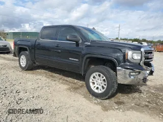 2016 GMC Sierra 1500 with VIN 3GTU2MEH6GG200680, listed as a Copart auction lot 82417134 with 121,912 mi miles and Salvage Title. Bid and sale history available at DreamBid. Image 4.