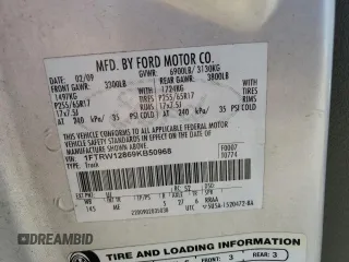 2009 Ford F-150 XL with VIN 1FTRW12869KB50968, listed as a Copart auction lot 55994985 with 243,144 mi miles and Salvage title. Bid and sale history available at DreamBid. Image 12.