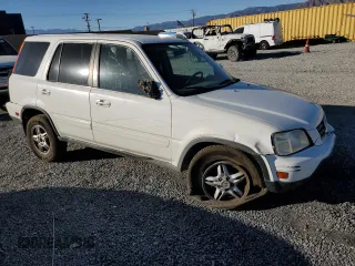 2000 Honda CR-V SE z VIN JHLRD1876YS019786, wystawiony jako Copart lot #88793865 z przebiegiem 168 507 mil mil oraz Szkoda całkowita • Salvage title. Historia ofert i sprzedaży dostępna na DreamBid. Obrazek 4.