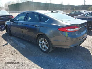 2018 Ford Fusion SE z VIN 3FA6P0H74JR233829, wystawiony jako IAAI lot #42049766 z przebiegiem 120 370 mil mil oraz . Historia ofert i sprzedaży dostępna na DreamBid. Obrazek 3.