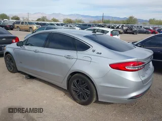 2018 Ford Fusion Energi SE with VIN 3FA6P0PU4JR123581, listed as a IAAI auction lot 41134246 with 226,813 mi miles. Bid and sale history available at carsss.com. Image 3.