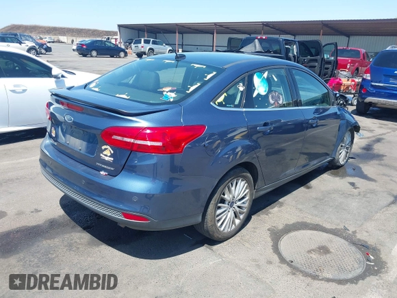 2018 Ford Focus Titanium with VIN 1FADP3J21JL323767, listed as a IAAI auction lot 42375218 with 104,440 mi miles and . Bid and sale history available at DreamBid. Image 4.