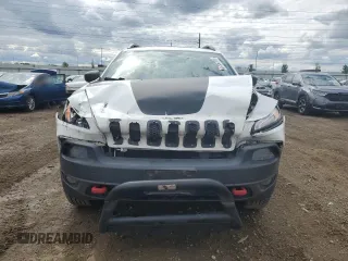 2016 Jeep Cherokee Trailhawk with VIN 1C4PJMBS8GW359461, listed as a Copart auction lot 57950705 with 146,124 mi miles and Salvage title. Bid and sale history available at DreamBid. Image 5.
