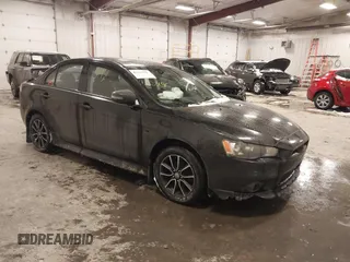 2015 Mitsubishi Lancer SE with VIN JA32V2FW6FU019508, listed as a IAAI auction lot 41633196 with 91,758 mi miles. Bid and sale history available at carsss.com. Image 1.