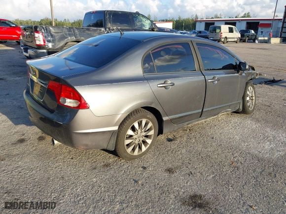2010 Honda Civic Sdn EX with VIN 19XFA1F80AE026715, listed as a IAAI auction lot 41887154 with 128,272 mi miles. Bid and sale history available at carsss.com. Image 4.
