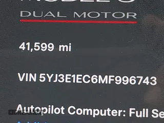 2021 Tesla Model 3 Performance with VIN 5YJ3E1EC6MF996743, listed as a IAAI auction lot 41509631 with 41,599 mi miles and . Bid and sale history available at DreamBid. Image 15.