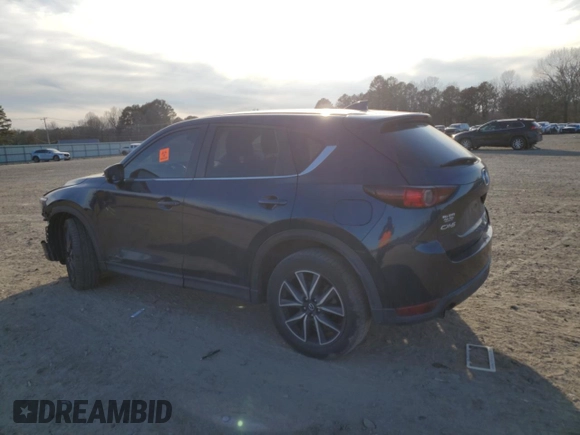 2018 Mazda CX-5 Touring with VIN JM3KFACM4J0470374, listed as a Copart auction lot 43048035 with 125,440 mi miles and Salvage Title. Bid and sale history available at carsss.com. Image 2.
